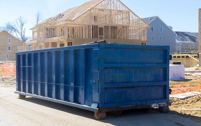dumpster in driveway for home renovation project